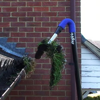 Professional gutter cleaning in Exeter using a powerful gutter vacuum system to safely remove leaves and debris.